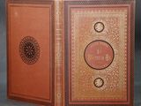 un vieux livre dans lequel figure l'image d'une horloge
