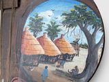 a picture of a painting on a wall hanging on a hook