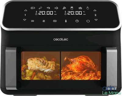 un gros plan d'une friteuse à air chaud contenant un poulet