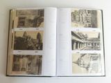 an open book with pictures of buildings on it