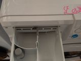 a white toilet that has been pulled out of the box
