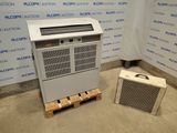 a small air conditioner sitting next to a large air conditioner