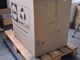 a box sitting on a pallet in a warehouse