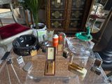 a glass table with a lot of items on top of it