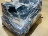 a couch that is wrapped in plastic and sitting on a pallet
