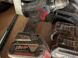 two tools that are sitting on top of a table