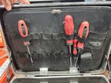 someone is holding a tool case with tools inside of it