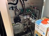 a machine that is sitting inside of a cabinet