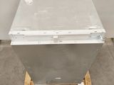 an image of a metal box sitting on top of a wooden pallet
