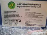 a plastic container with a sign on it wrapped in plastic