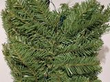 a small christmas tree with a green star on it