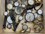 many different types of watches in a box