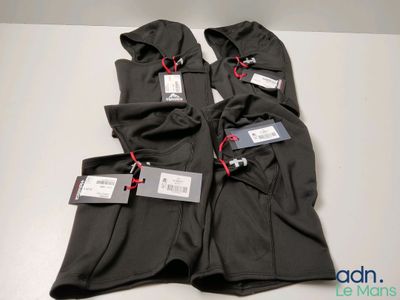 three pairs of men ' s black pants with tags on them