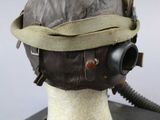 a helmet with a gas mask attached to it