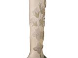 a vase with a floral design on it on a white background
