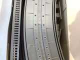 a box with a bunch of train tracks inside of it