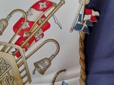 a pillow with a picture of a sailor on it