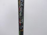 a close up of a baseball bat with graffiti on it