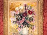 a painting of flowers in a vase on a red wall