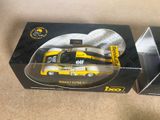 a box with a picture of a yellow bus on it