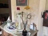 a table with a vase on top of it in a living room