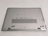 a silver laptop that is sitting on a table
