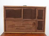 an image of a wooden box that has some sort of art on top of it