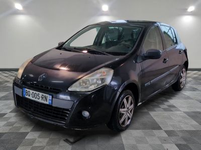 a picture of a small black car parked on a checkered floor