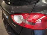 a close up of a car ' s tail light and tail light