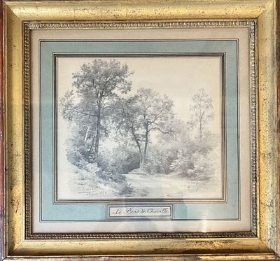 an old picture of a wooded scene with trees in a gold frame
