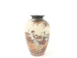 a vase with a painting on it on a white background