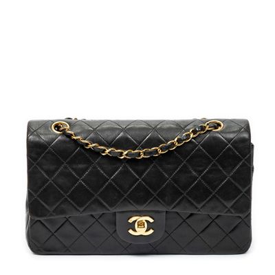 a chanel black quilted lambskin shoulder bag with gold hardware