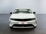 the front view of a white car in a white room