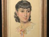 portrait of a woman in a yellow dress by a black background
