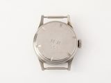 an image of a close up of a wrist watch on a white surface