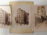 three old photos of buildings are displayed on a white surface