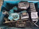 a blue tool box with tools in it on a table