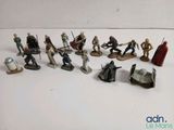many figurines of star wars characters on the table