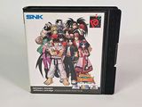 La boîte du jeu SNK est posée sur une surface blanche.