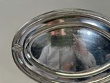 a person taking a picture of themselves in a mirror