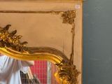 a man that is standing in front of a mirror