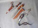 three different types of knives on the table