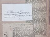 an old book with a piece of paper on top of it