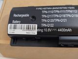 a black battery in a box on a table