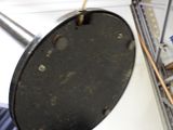 a close up of a metal object on a shelf