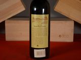 a bottle of wine that is sitting on a table
