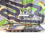 a toy train set in a box on a table