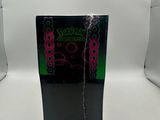 the back of a black box with a pink and green design on it