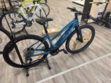 two bikes that are sitting on the floor in the store