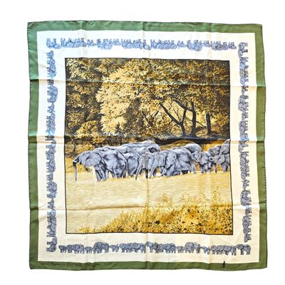 elephants in a field with trees in the background on a green and yellow scarf